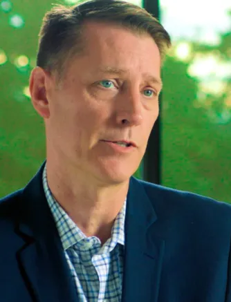 Close-up portrait of a business professional outdoors