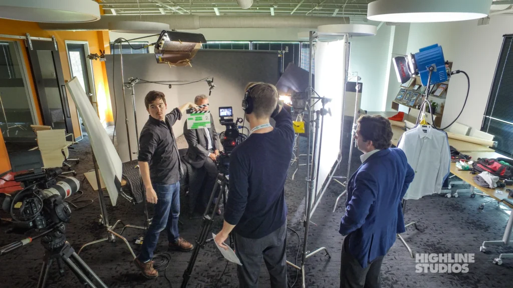 Director Damon Hoydysh on set during a Highline Studios corporate video shoot