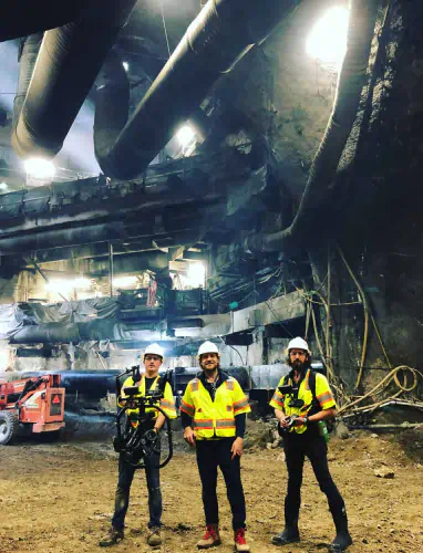 Highline Studios video crew in safety gear on an active construction jobsite