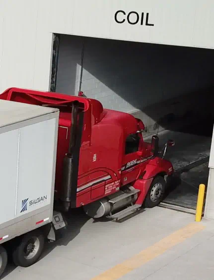 Silgan Containers truck at the COIL loading dock